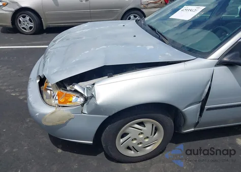 1999 Ford Escort Lx z USA, uszkodzony, nr VIN 1FAFP10P6XW164410